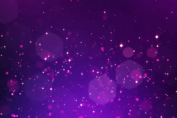Glowing purple bokeh background, white circle and star lights