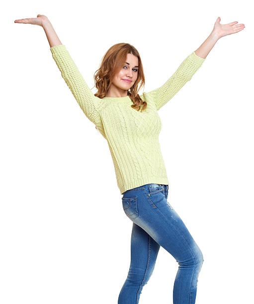 istock young girl casual dressed jeans and green sweater on white 525979184