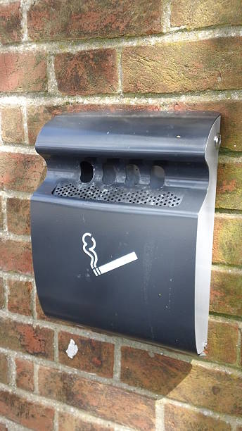 istock Wall-mounted outdoor cigarette ashtray 525980112