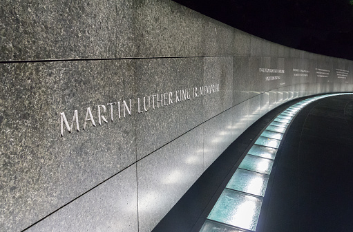 Washington D.C., U.S.A. - July 8, 2015: The entrance section to the Martin Luther King, Jr. Memorial at Washinton D.C. at night time, with the lights on.