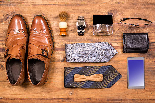 istock Men's accessories organized on table.  No people.  Knolling. 525983446