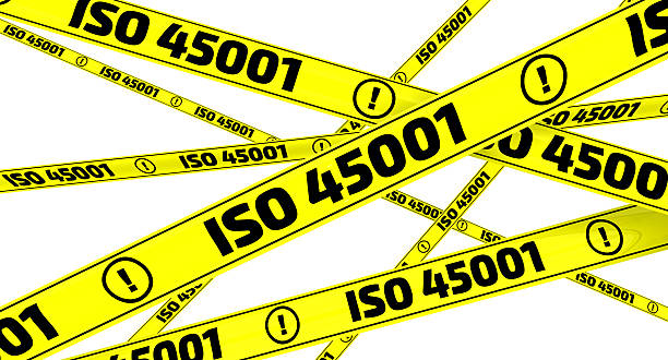 istock ISO 45001. Yellow warning tapes 525983476