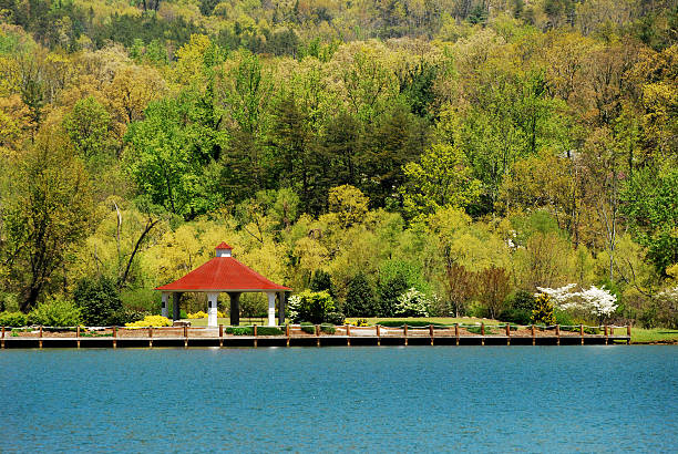 Beautiful green and turquoise colors are featured in this image of Lake Lure, NC. The red pavilion stands out in great contrast to make this an appealing photograph.