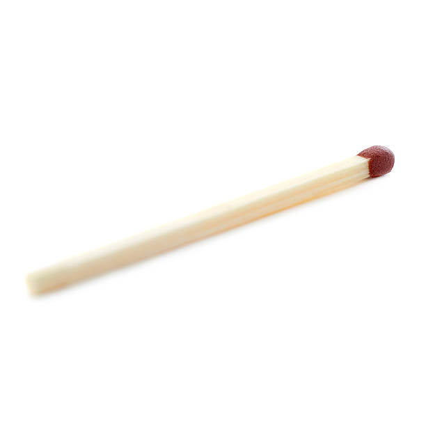 istock Wooden match isolated over the white background 525984844