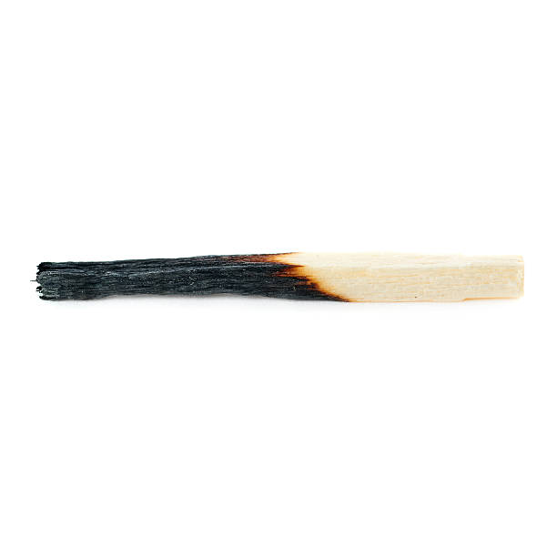 istock Wooden match isolated over the white background 525985078