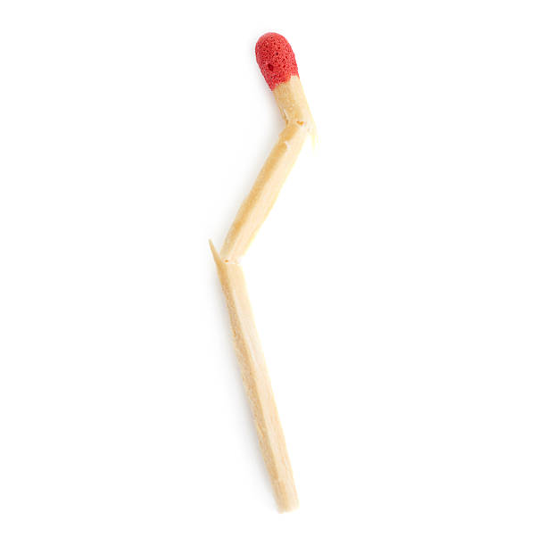 istock Broken Wooden match isolated over the white background 525985312