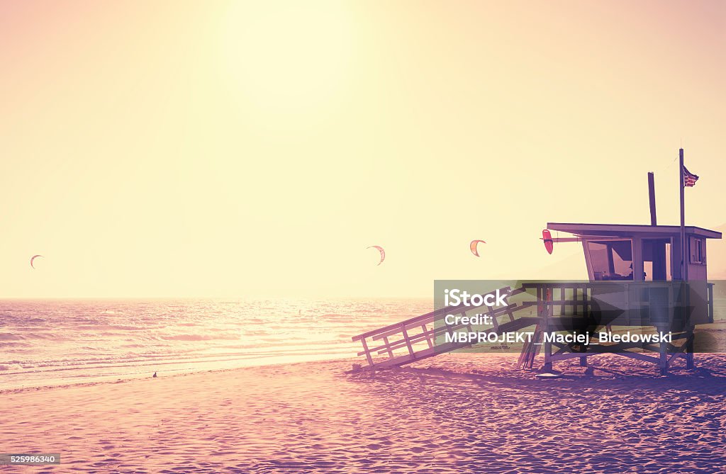 Vintage toned picture of lifeguard tower at sunset, Malibu. Vintage toned picture of lifeguard tower at sunset, Malibu, USA. Malibu Stock Photo
