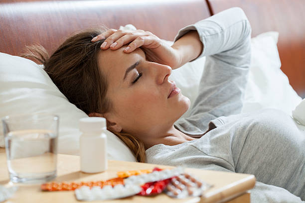 Woman suffering from flu stock photo