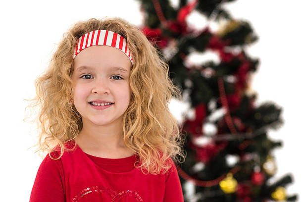 istock Festive little girl smiling at camera 525989231