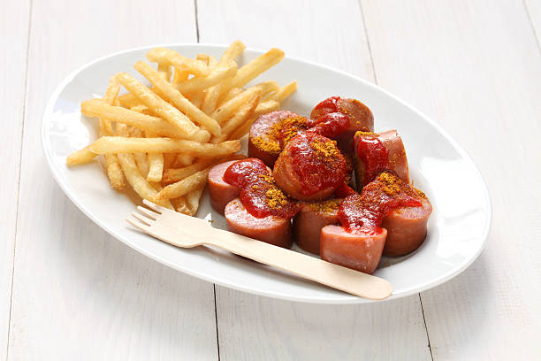 currywurst, curry salsiccia - currywurst foto e immagini stock