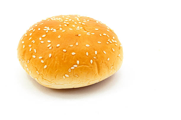 istock Close up bread and sesame on white background 525991947
