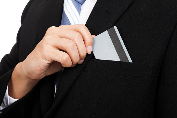 istock Asian businessman pull a card from his pocket 526020323