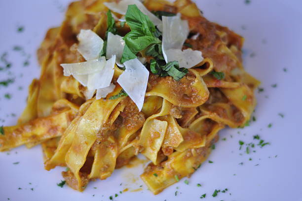 istock Italian Pasta with Bolognese Sauce, Parmesan and Basil 526020487