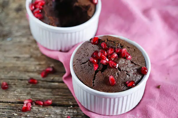 Cupcake in a ramekin, chocolate and coffee soft centre mud cake and pomegranate apple seeds
