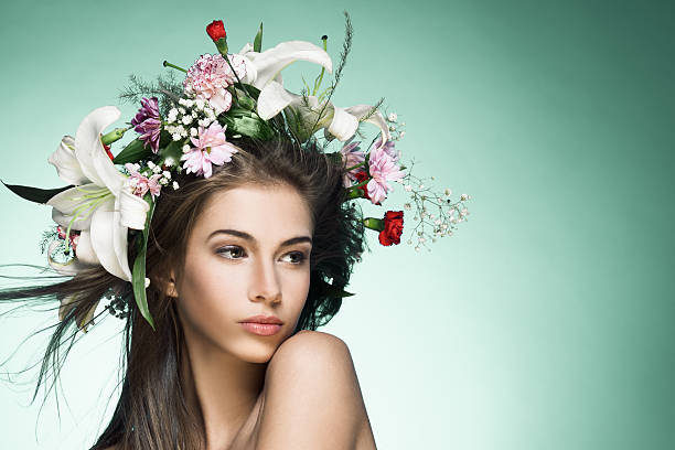istock Beautiful woman with flower wreath. Space for text. 526023159