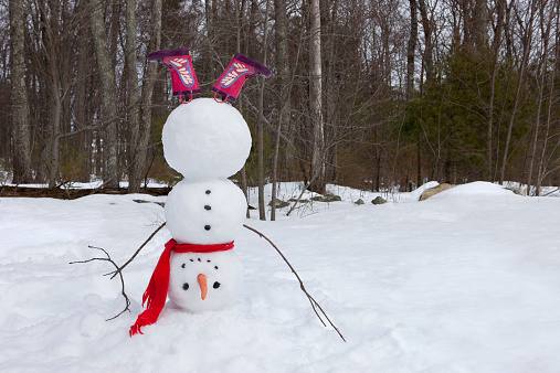 Upside down snowman in boots