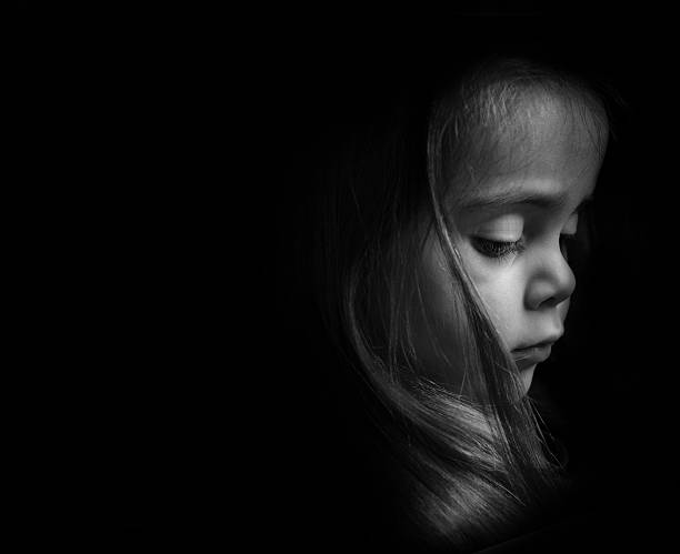 istock Low key Portrait of a young child 526035067
