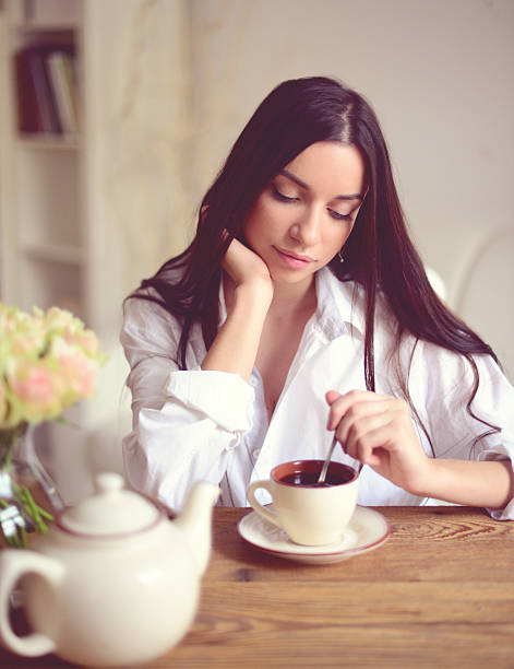 istock young brunette woman in home interior. 526036873