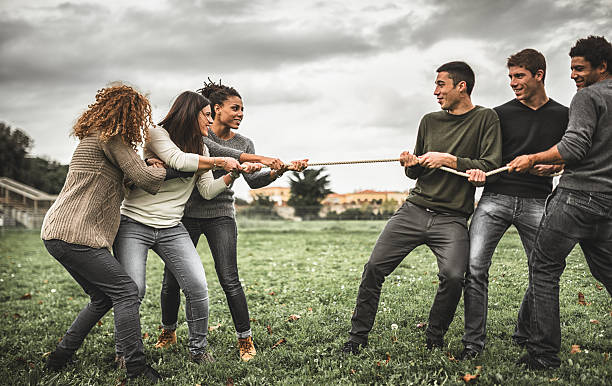istock Friends doing the Tug of war - teamwork 526038237