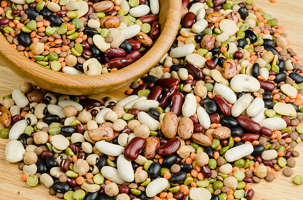 istock legumes on wood, closeup, background 526039123
