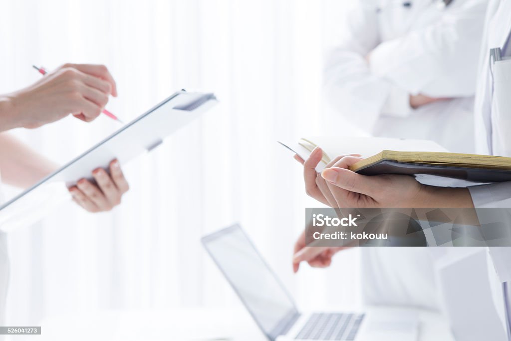Doctor and female doctor and female nurse Alternative Therapy Stock Photo