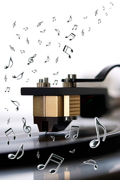 istock Close-up of Record-player with many flying musical note 526041289