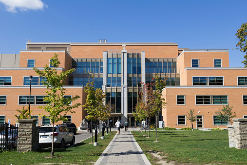 Toronto, Canada - September 17, 2014: The outside of  St. Joseph's Health Centre during the day. People can be seen.