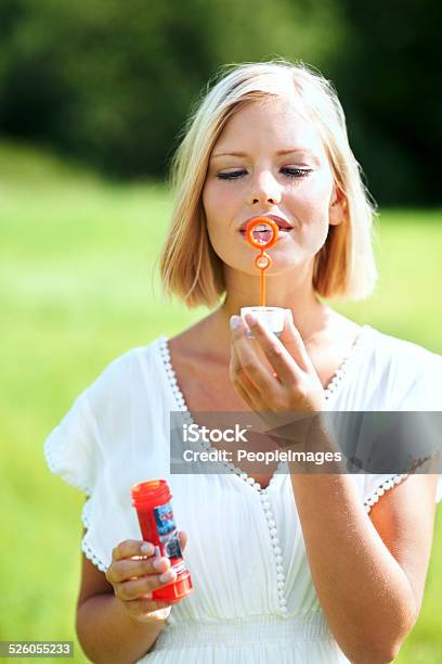 Indulging Her Inner Child Stock Photo - Download Image Now - Bottle, Bubble Wand, 20-29 Years