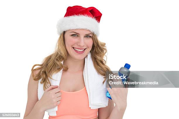 Festive Fit Blonde Holding Bottle Of Water Stock Photo - Download Image Now - 20-24 Years, 20-29 Years, Adult