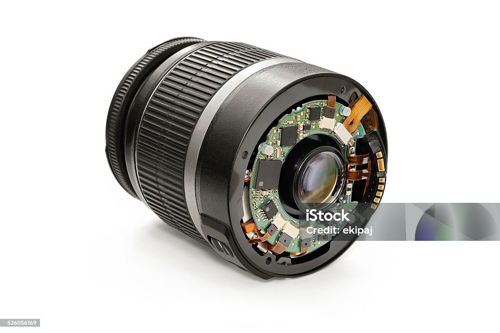 Disassembled lens. Disassembled removable lens, isolated on a white background. Lunar Module Stock Photo