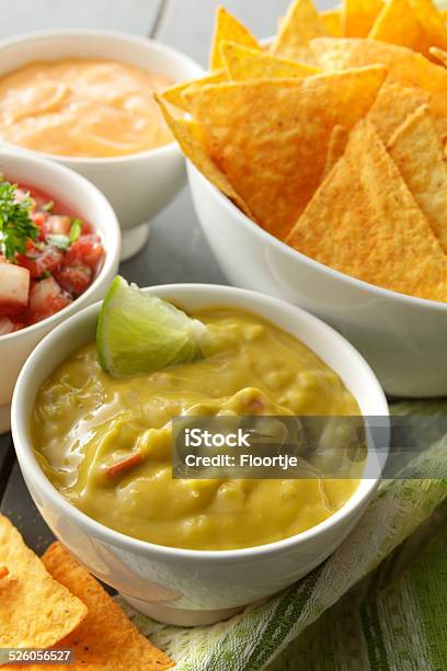 Texmex Food Guacamole And Nachos Stock Photo - Download Image Now - Cheese, Healthy Eating, Nacho Chip