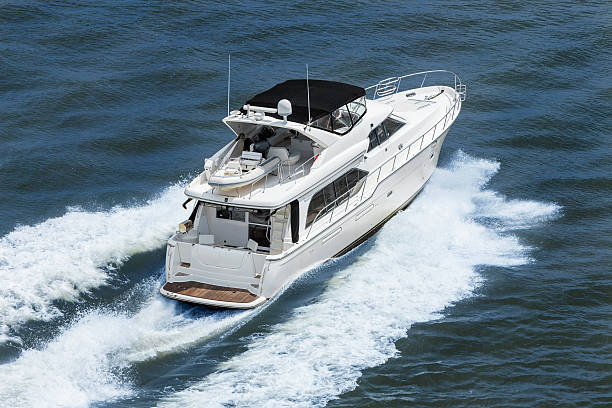 istock Luxury Power Boat Yacht on Blue Sea 526056933
