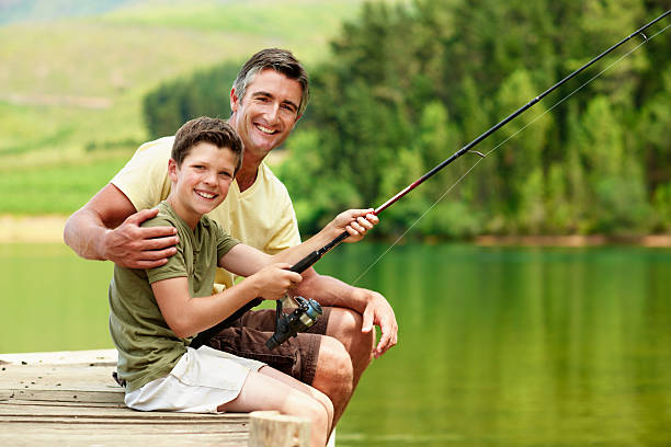istock Happiness is a fishing trip with your dad 526058419