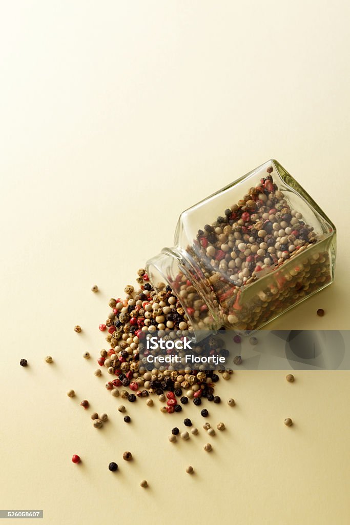 Flavouring: Four Seasons Peppercorns Yellow Background Stock Photo