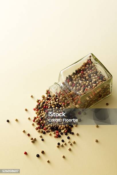Flavouring Four Seasons Peppercorns Stock Photo - Download Image Now - Yellow Background, Black Peppercorn, Cayenne Powder