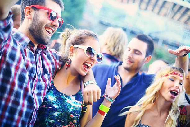 istock People enjoying concert party. 526061473