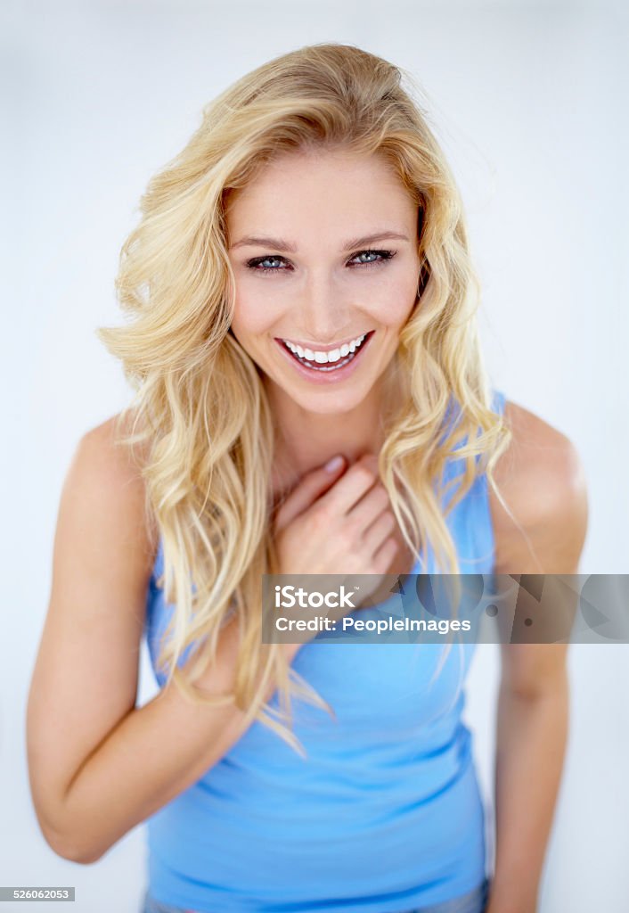 You're such a joker! Portrait of a pretty young woman laughing at you whil isolated on white One Woman Only Stock Photo