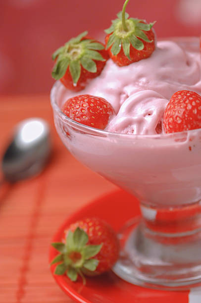 istock Cup of strawberry ice cream 526062633