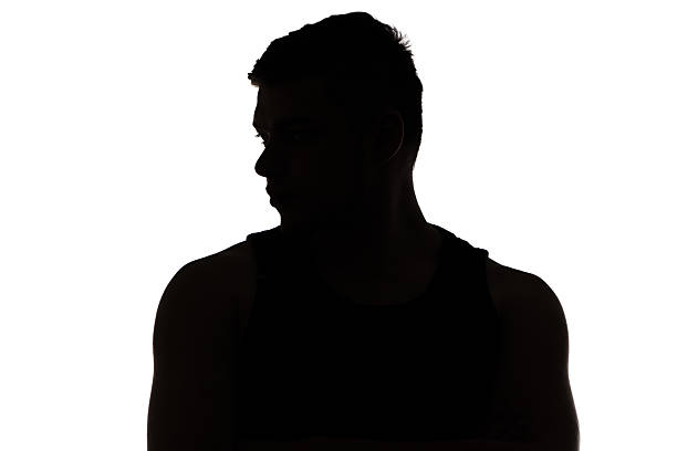 istock Photo of man's silhouette looking away 526069639