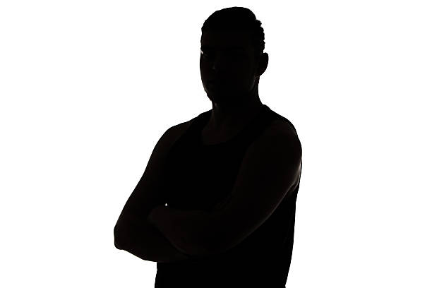 istock Photo of man's silhouette looking at camera 526069645