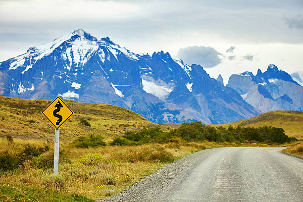 istock Winging road sign in Torres del Paine 526072545