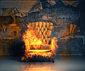 istock burning armchair 526073941