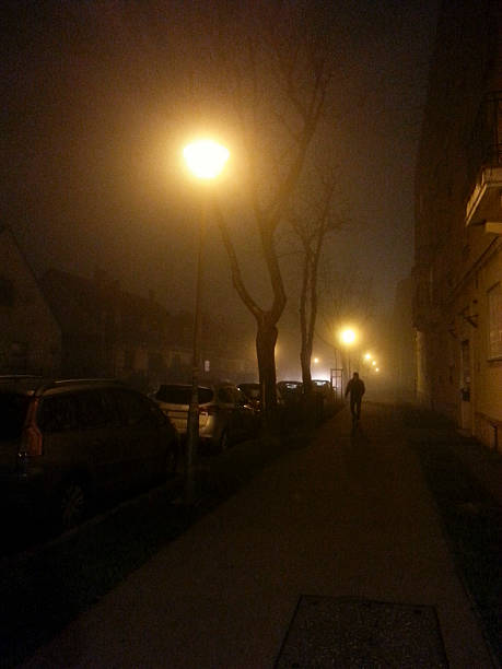 istock Thief at night  in the street 526075875