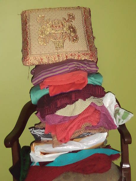 istock Cushion lying over clothes on a chair 526085515