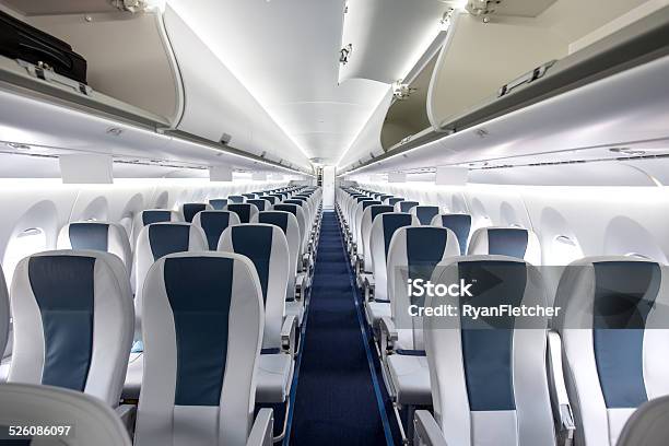 Commercial Passenger Aircraft Cabin Stock Photo - Download Image Now - Airplane, Passenger Cabin, Vehicle Seat