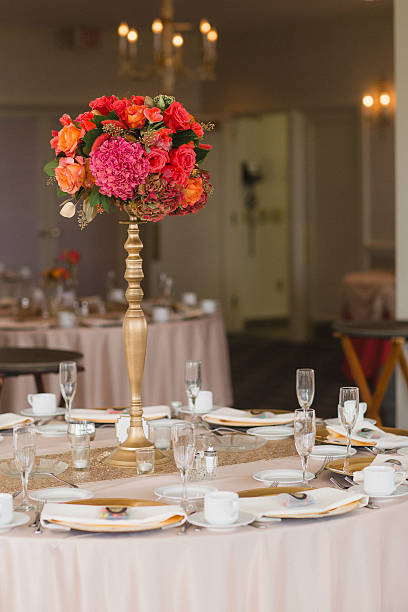 istock Wedding Reception Tables with Floral Centerpieces 526088231