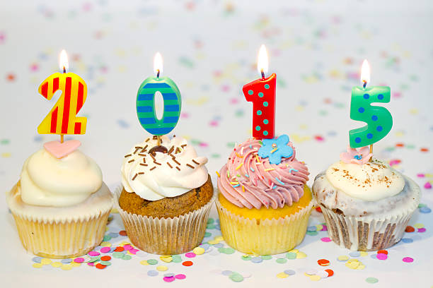 istock New year cupcakes on abstract colorful background 526091315