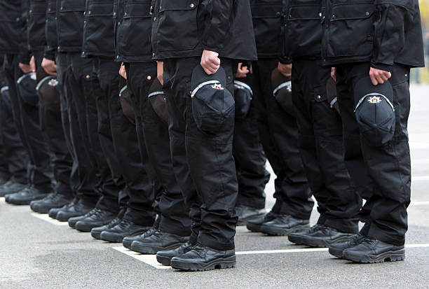 istock Policemen legs and boots 526110469