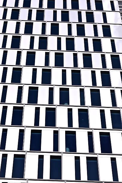 istock windows of office buildings 526111147