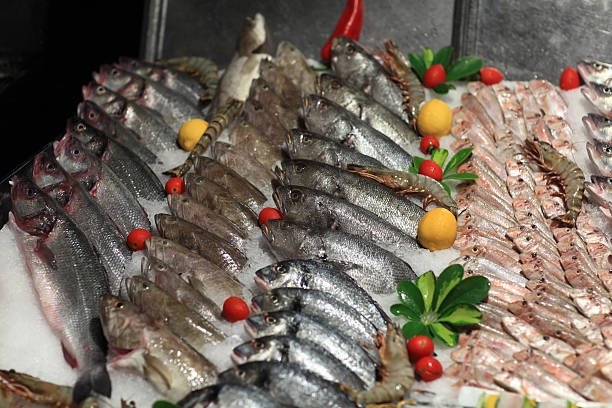 istock Raw fishes on the counter 526111281